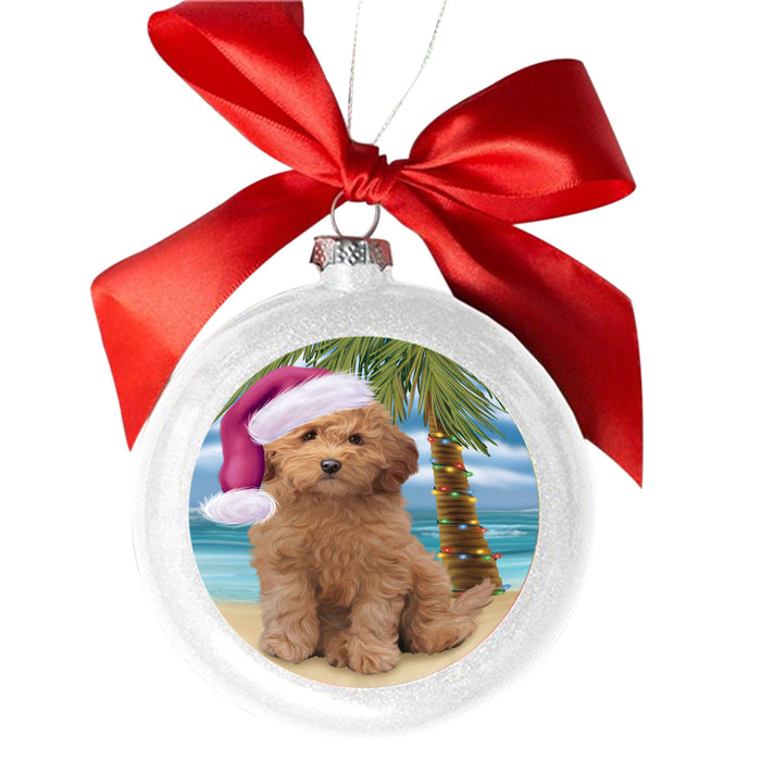 Summertime Happy Holidays Christmas Goldendoodle Dog on Tropical Island Beach White Round Ball Christmas Ornament WBSOR49372