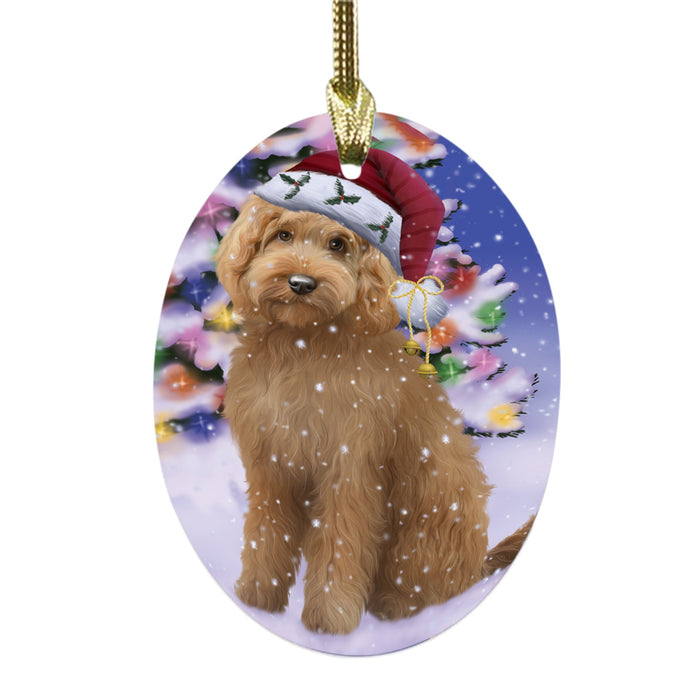 Winterland Wonderland Goldendoodle Dog In Christmas Holiday Scenic Background Oval Glass Christmas Ornament OGOR49578