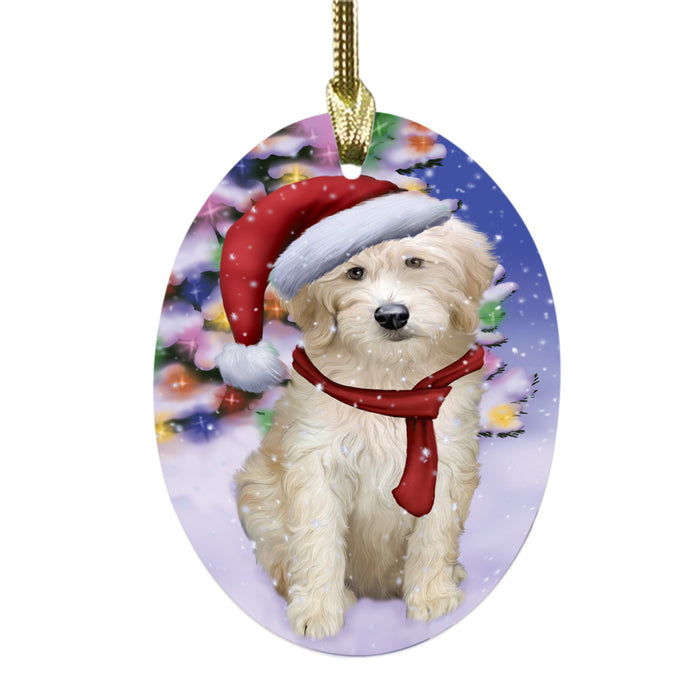 Winterland Wonderland Goldendoodle Dog In Christmas Holiday Scenic Background Oval Glass Christmas Ornament OGOR49580
