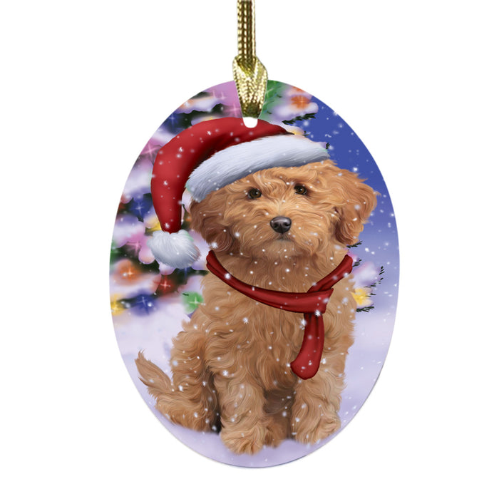 Winterland Wonderland Goldendoodle Dog In Christmas Holiday Scenic Background Oval Glass Christmas Ornament OGOR49581