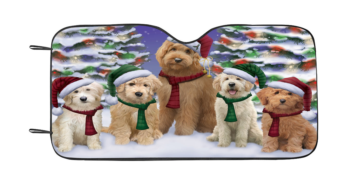 Goldendoodle Dogs Christmas Family Portrait in Holiday Scenic Background Car Sun Shade