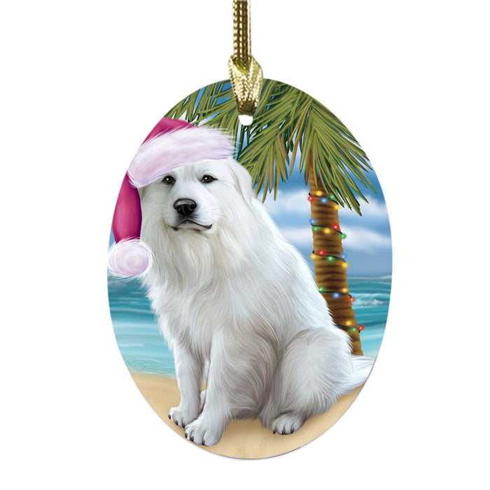 Summertime Happy Holidays Christmas Great Pyrenees Dog on Tropical Island Beach Oval Glass Christmas Ornament OGOR49373