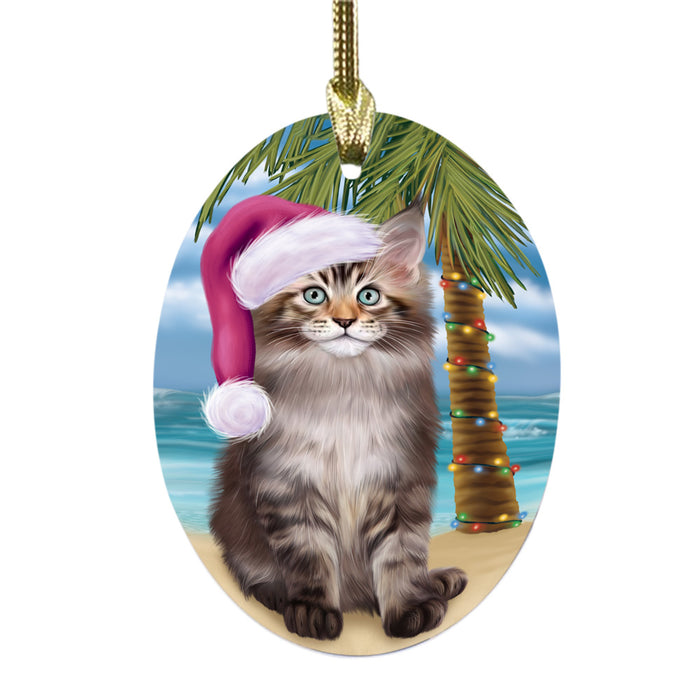 Summertime Happy Holidays Christmas Maine Coon Cat on Tropical Island Beach Oval Glass Christmas Ornament OGOR49383