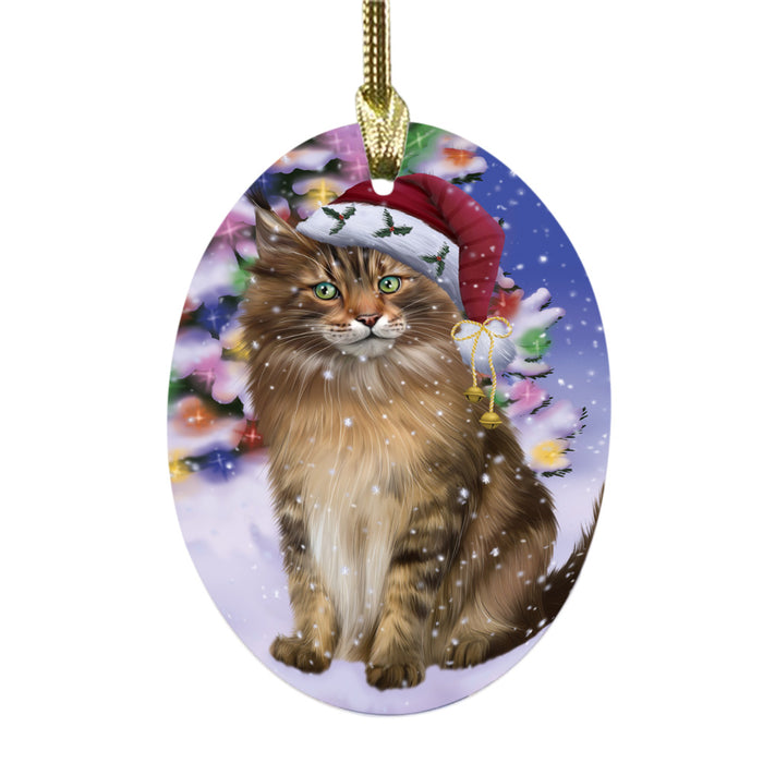 Winterland Wonderland Maine Coon Cat In Christmas Holiday Scenic Background Oval Glass Christmas Ornament OGOR49600