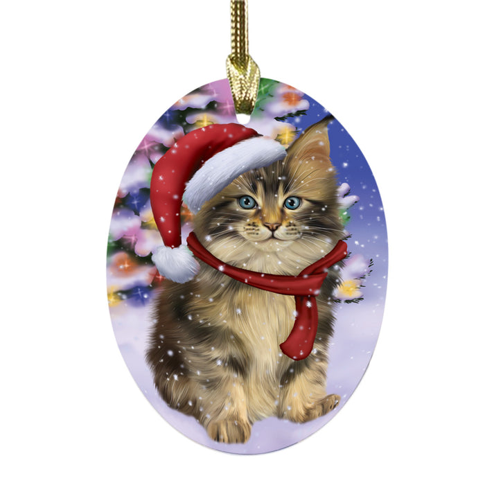 Winterland Wonderland Maine Coon Cat In Christmas Holiday Scenic Background Oval Glass Christmas Ornament OGOR49602
