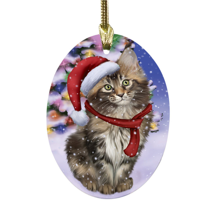 Winterland Wonderland Maine Coon Cat In Christmas Holiday Scenic Background Oval Glass Christmas Ornament OGOR49603