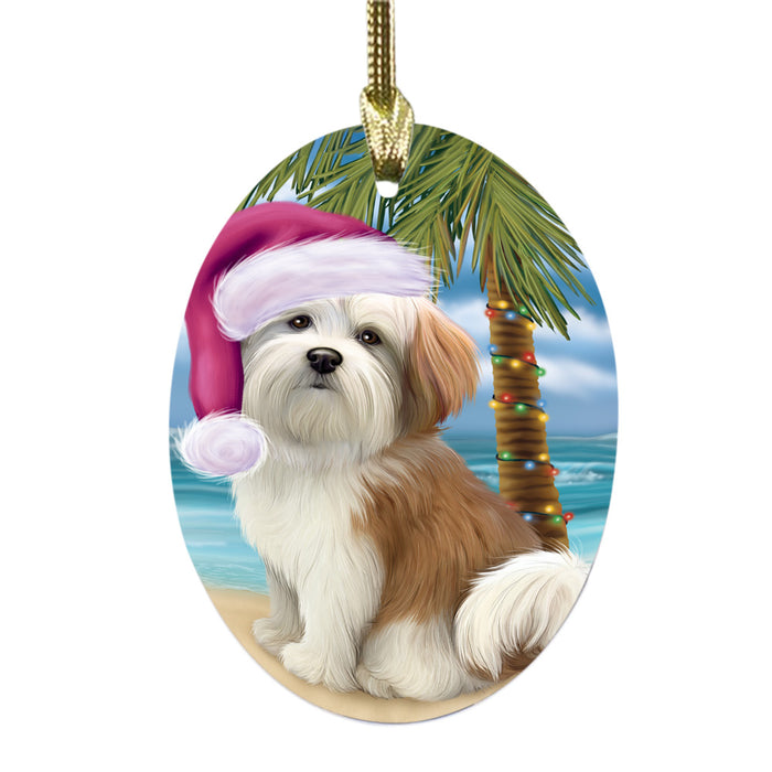 Summertime Happy Holidays Christmas Malti Tzu Dog on Tropical Island Beach Oval Glass Christmas Ornament OGOR49385