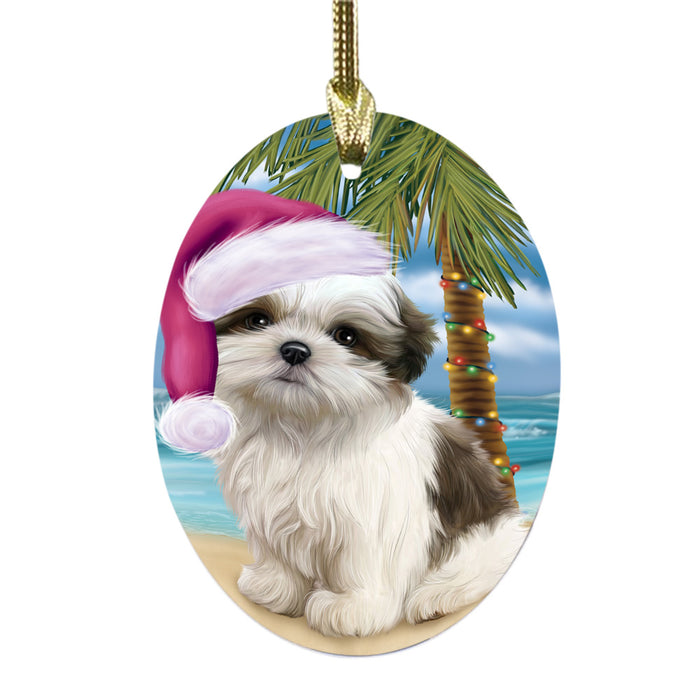 Summertime Happy Holidays Christmas Malti Tzu Dog on Tropical Island Beach Oval Glass Christmas Ornament OGOR49386