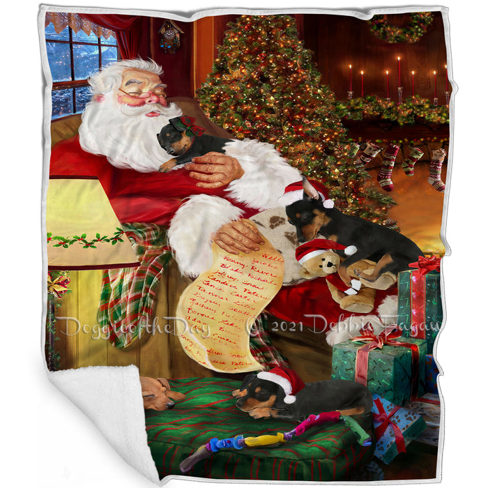 Miniature Pinscher Dog and Puppies Sleeping with Santa Blanket