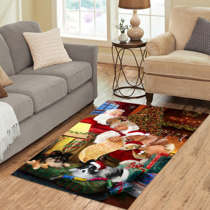 Santa Sleeping with Pomeranian Dogs Area Rug