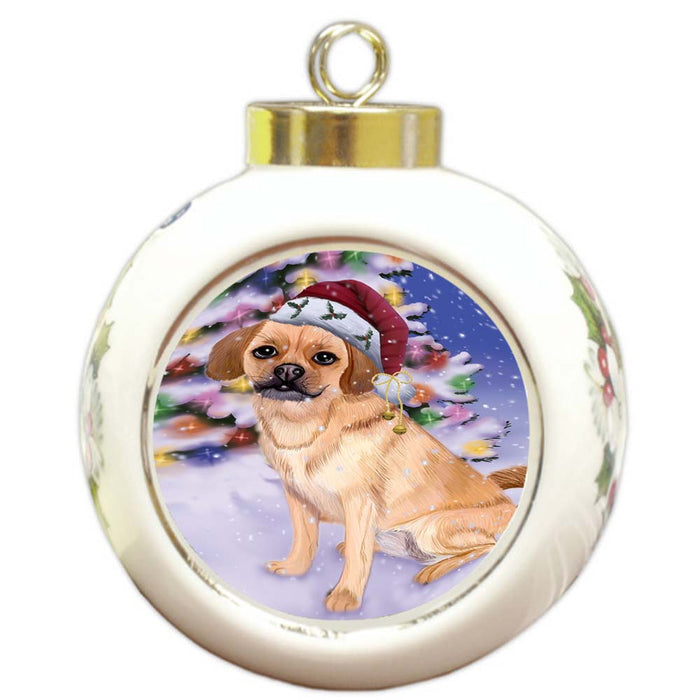 Winterland Wonderland Puggle Dog In Christmas Holiday Scenic Background Round Ball Christmas Ornament RBPOR56070