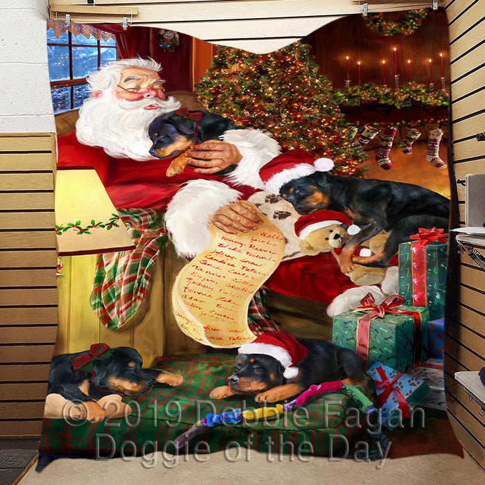 Santa Sleeping with Rottweiler Dogs Quilt