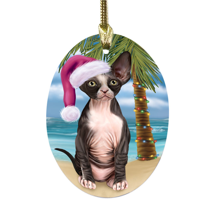 Summertime Happy Holidays Christmas Sphynx Cat on Tropical Island Beach Oval Glass Christmas Ornament OGOR49395