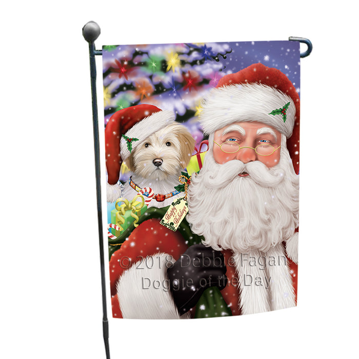 Santa Carrying Tibetan Terrier Dog and Christmas Presents Garden Flag GFLG54088