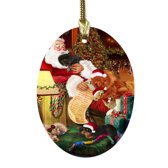 Tibetan Mastiffs Dog and Puppies Sleeping with Santa Oval Glass Christmas Ornament OGOR49324