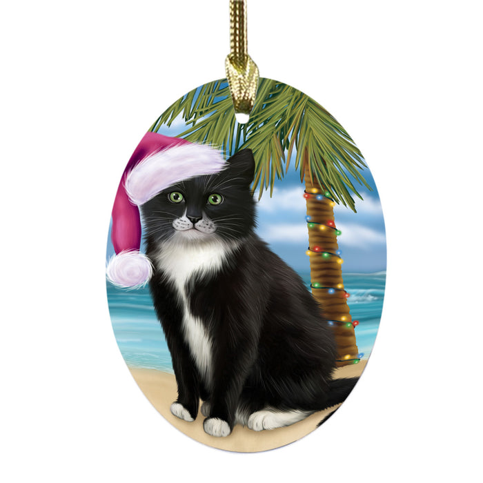 Summertime Happy Holidays Christmas Tuxedo Cat on Tropical Island Beach Oval Glass Christmas Ornament OGOR49404