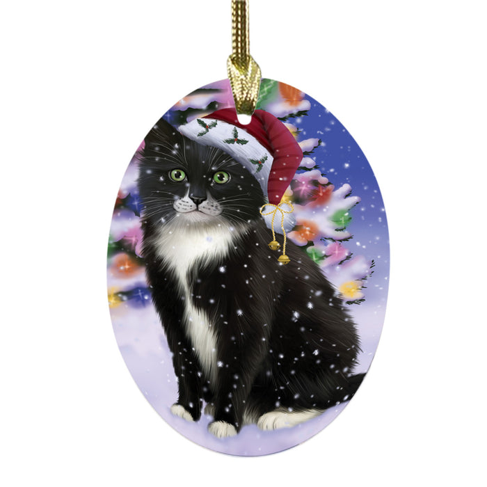 Winterland Wonderland Tuxedo Cat In Christmas Holiday Scenic Background Oval Glass Christmas Ornament OGOR49651