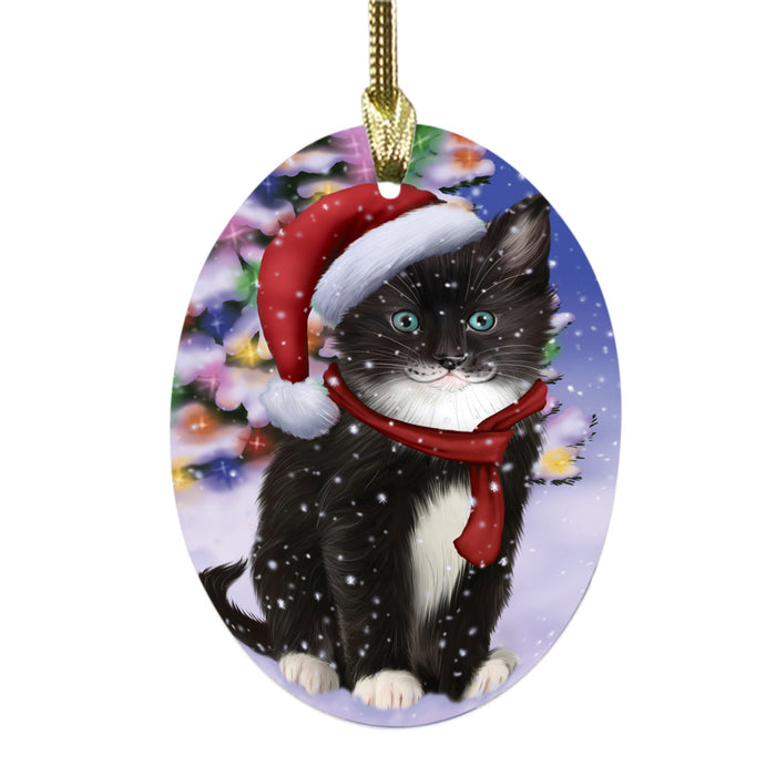 Winterland Wonderland Tuxedo Cat In Christmas Holiday Scenic Background Oval Glass Christmas Ornament OGOR49652