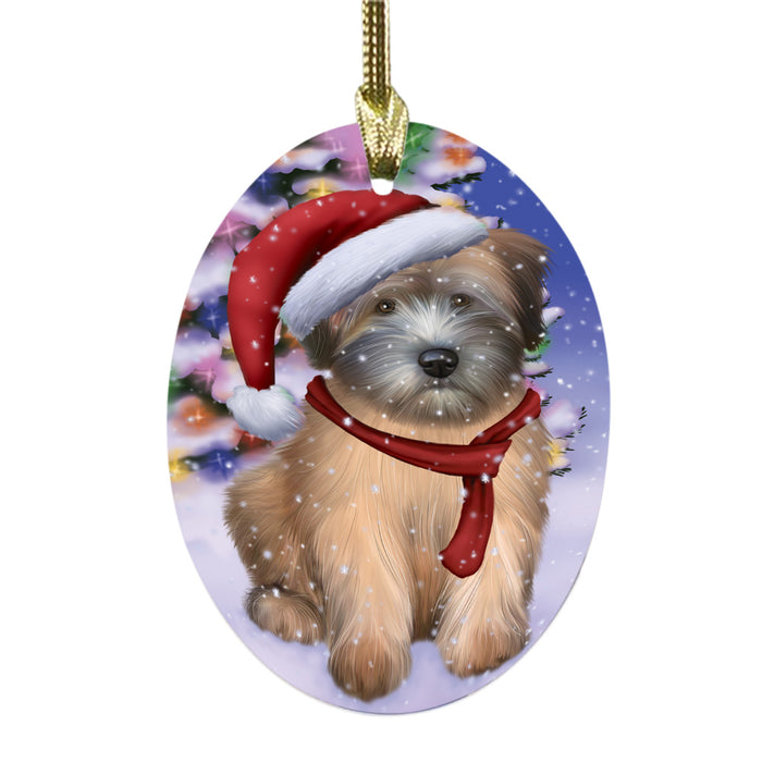 Winterland Wonderland Wheaten Terrier Dog In Christmas Holiday Scenic Background Oval Glass Christmas Ornament OGOR49658