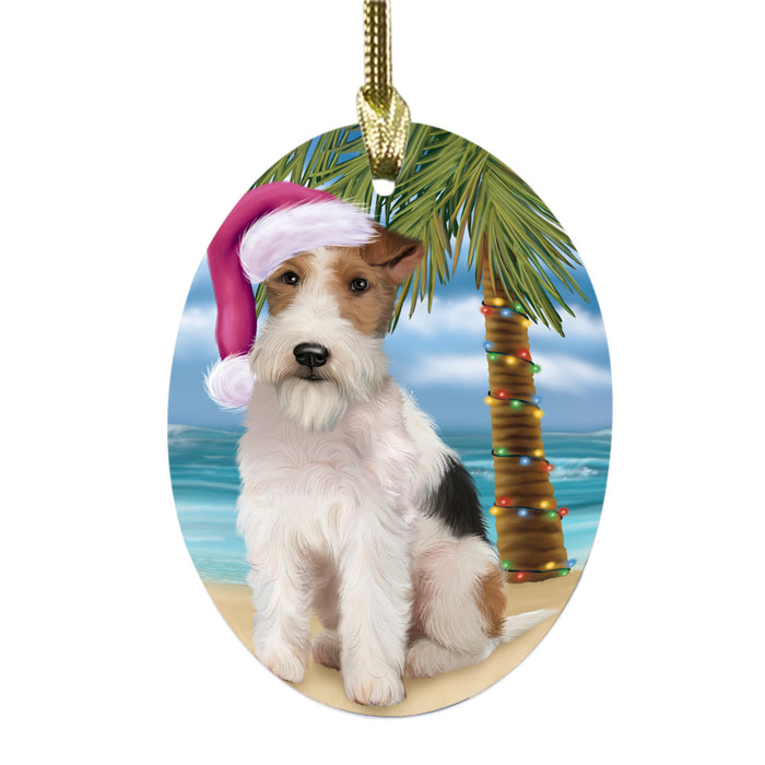 Summertime Happy Holidays Christmas Wire Fox Terrier Dog on Tropical Island Beach Oval Glass Christmas Ornament OGOR49410