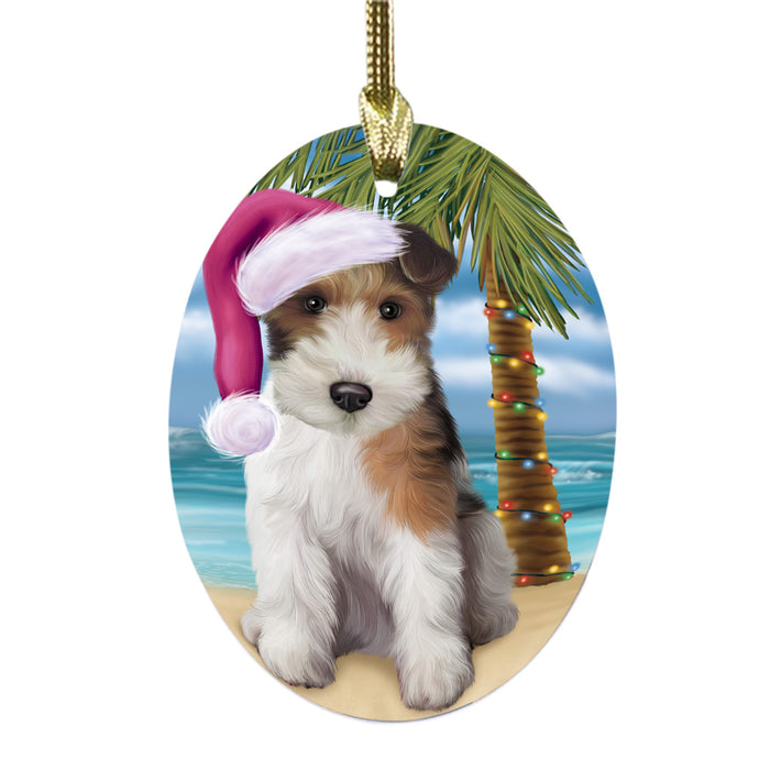 Summertime Happy Holidays Christmas Wire Fox Terrier Dog on Tropical Island Beach Oval Glass Christmas Ornament OGOR49412