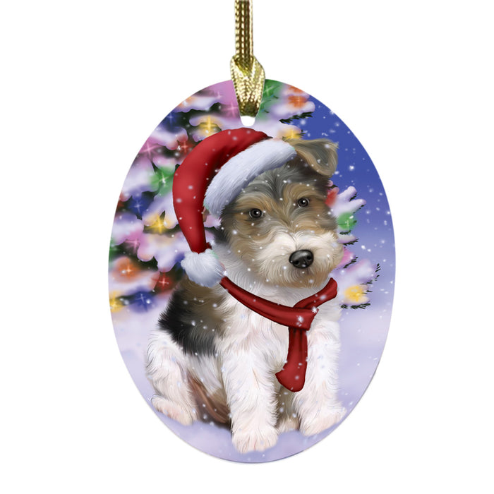 Winterland Wonderland Wire Fox Terrier Dog In Christmas Holiday Scenic Background Oval Glass Christmas Ornament OGOR49663