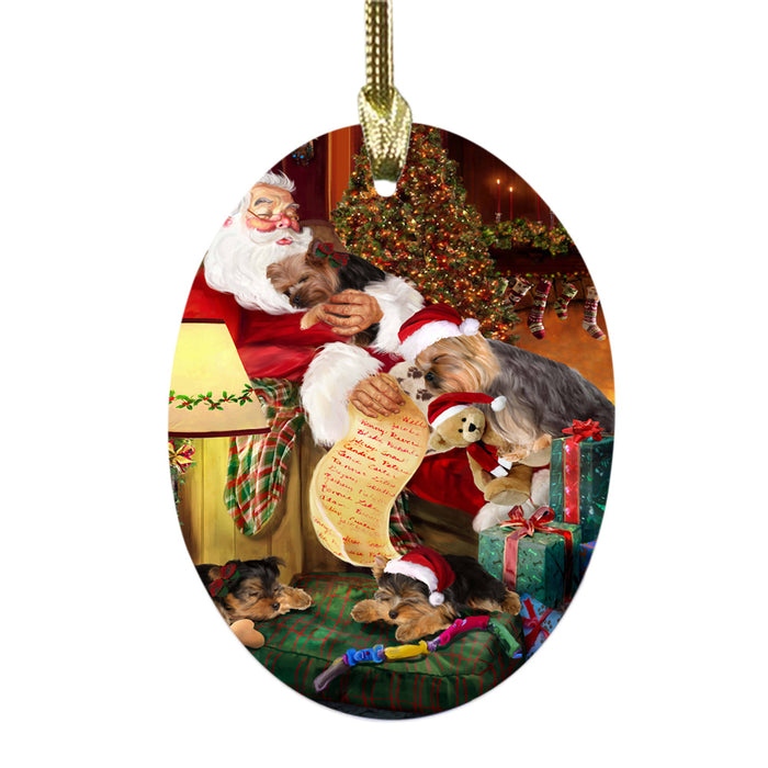 Yorkshire Terriers Dog and Puppies Sleeping with Santa Oval Glass Christmas Ornament OGOR49331