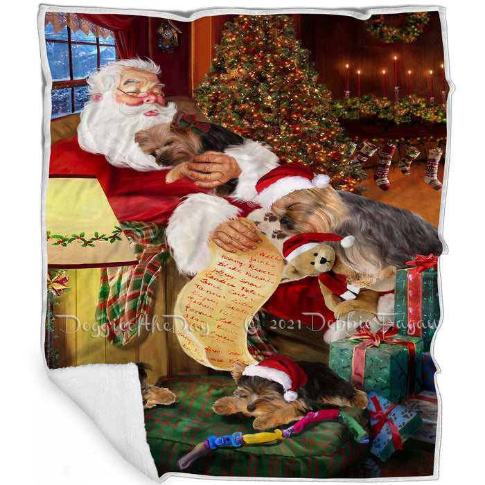 Yokshire Terrier Dog and Puppies Sleeping with Santa Blanket