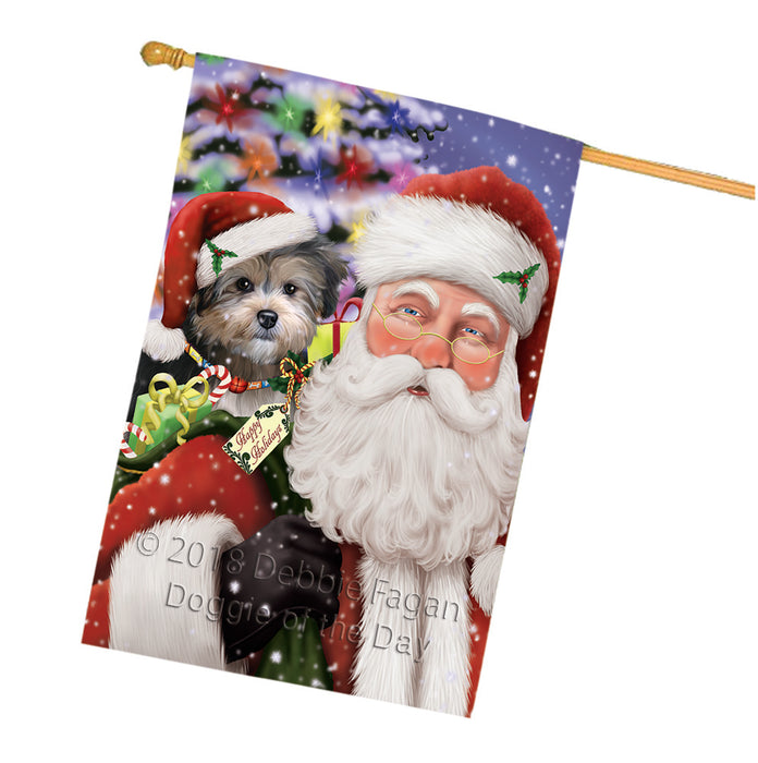 Santa Carrying Yorkipoo Dog and Christmas Presents House Flag FLG53914