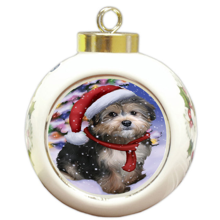 Winterland Wonderland Yorkipoo Dog In Christmas Holiday Scenic Background Round Ball Christmas Ornament RBPOR53796