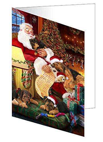 Airedale Dog and Puppies Sleeping with Santa Handmade Artwork Assorted Pets Greeting Cards and Note Cards with Envelopes for All Occasions and Holiday Seasons