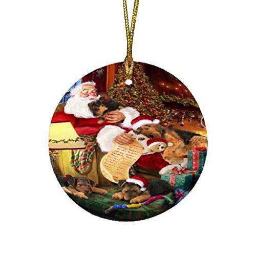 Airedale Dog and Puppies Sleeping with Santa Round Christmas Ornament