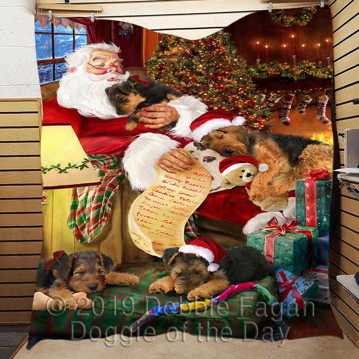 Santa Sleeping with Airedale Dogs Quilt