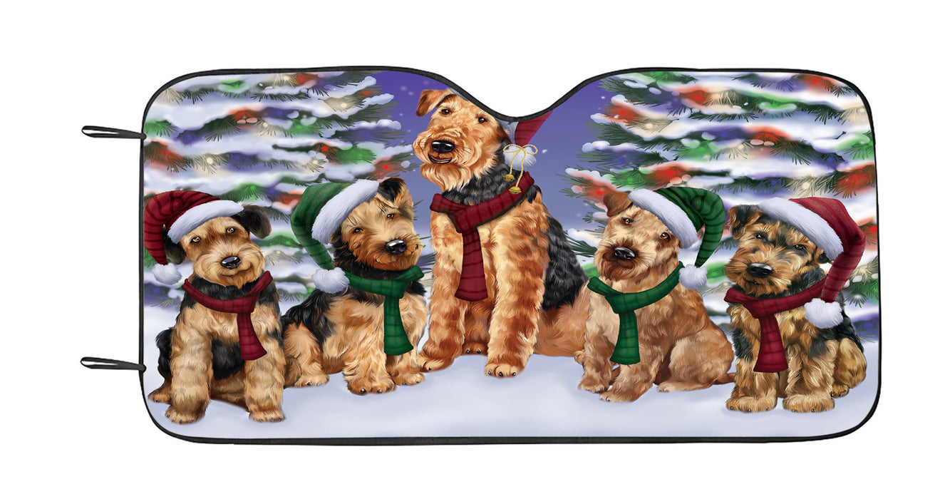 Airedale Dogs Christmas Family Portrait in Holiday Scenic Background Car Sun Shade