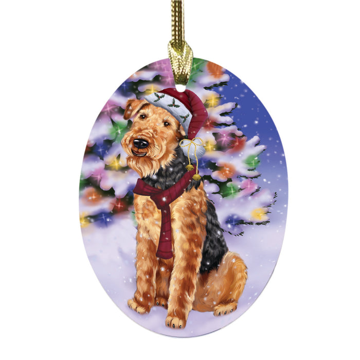 Winterland Wonderland Airedale Dog In Christmas Holiday Scenic Background Oval Glass Christmas Ornament OGOR49480