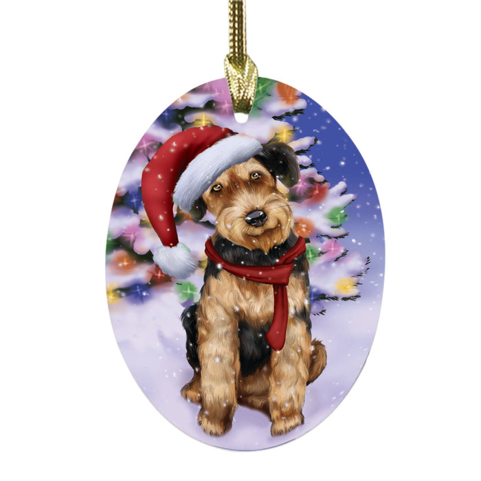 Winterland Wonderland Airedale Dog In Christmas Holiday Scenic Background Oval Glass Christmas Ornament OGOR49481