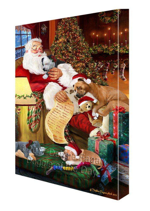 American Staffordshire Dog and Puppies Sleeping with Santa Canvas Wall Art