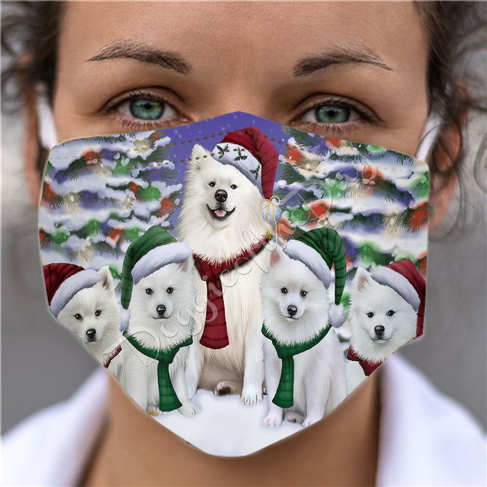 American Eskimo Dogs Christmas Family Portrait in Holiday Scenic Background Face Mask FM48306