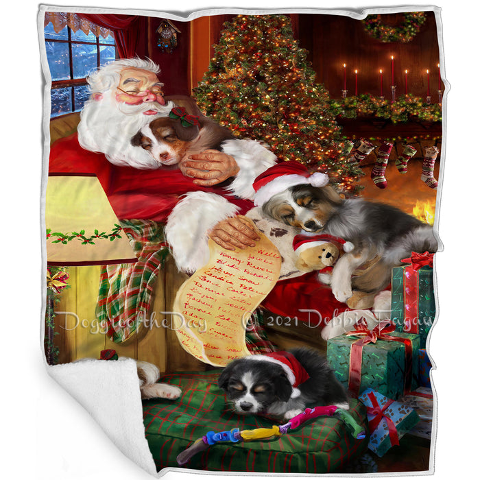 Australian Shepherd Dog and Puppies Sleeping with Santa Blanket