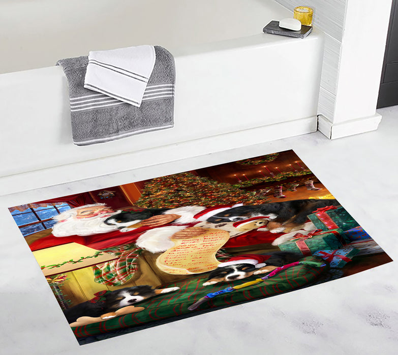 Santa Sleeping with Bernese Mountain Dogs Bath Mat