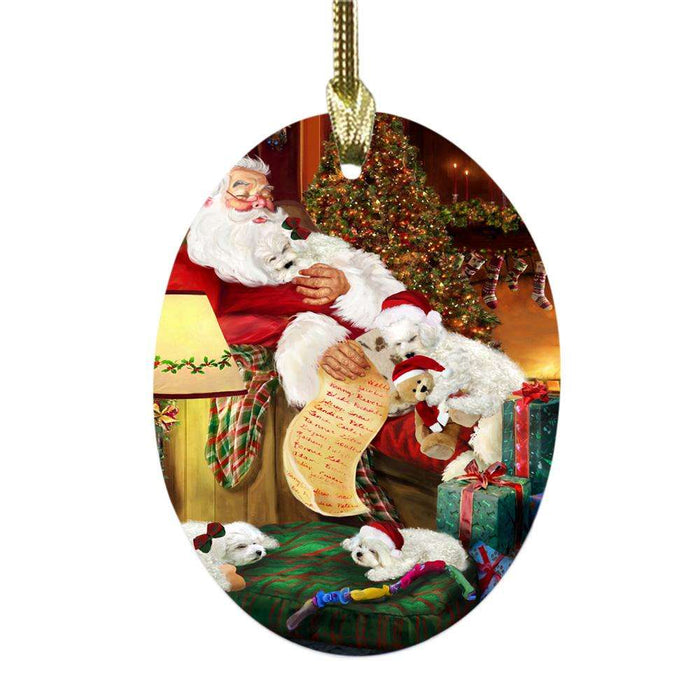 Bichon Frises Dog and Puppies Sleeping with Santa Oval Glass Christmas Ornament OGOR49249