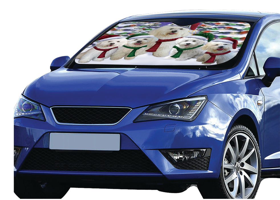 Bichon Frise Dogs Christmas Family Portrait in Holiday Scenic Background Car Sun Shade