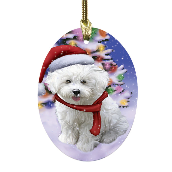 Winterland Wonderland Bichon Frise Dog In Christmas Holiday Scenic Background Oval Glass Christmas Ornament OGOR49521