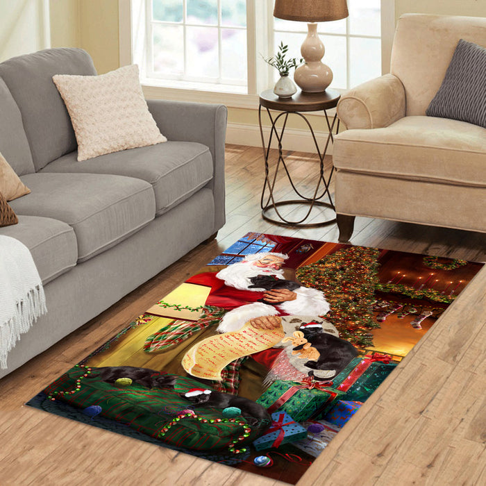 Santa Sleeping with Black Cats Area Rug