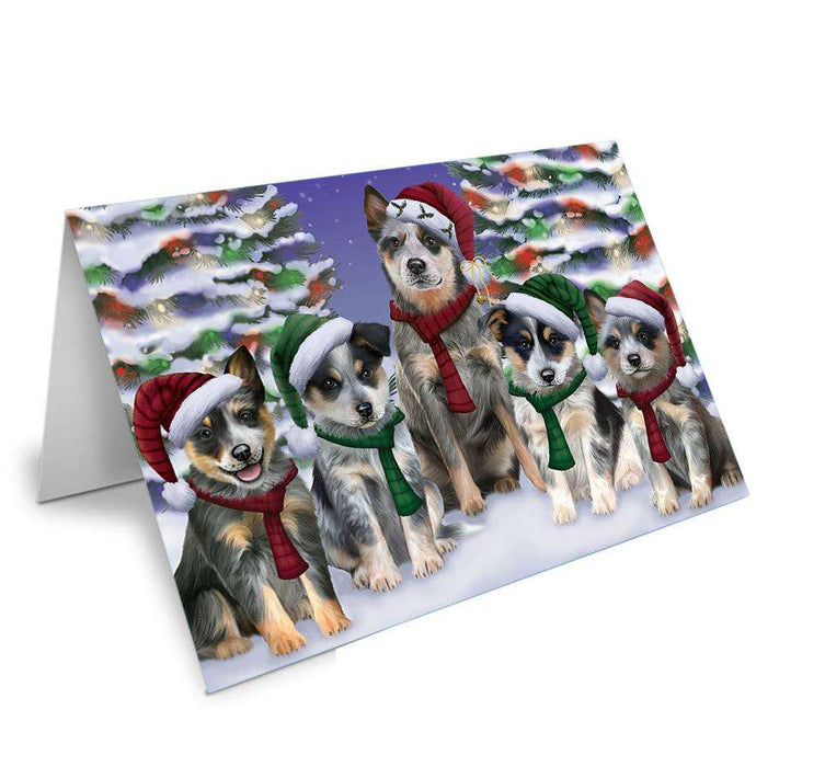 Blue Heelers Dog Christmas Family Portrait in Holiday Scenic Background Handmade Artwork Assorted Pets Greeting Cards and Note Cards with Envelopes for All Occasions and Holiday Seasons GCD62156