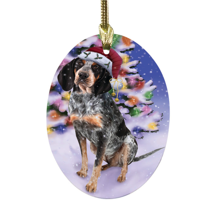 Winterland Wonderland Bluetick Coonhound Dog In Christmas Holiday Scenic Background Oval Glass Christmas Ornament OGOR49530
