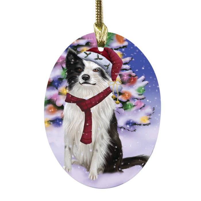 Winterland Wonderland Border Collie Dog In Christmas Holiday Scenic Background Oval Glass Christmas Ornament OGOR49532