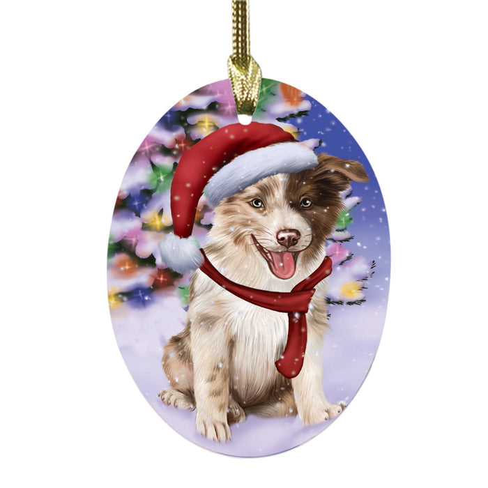 Winterland Wonderland Border Collie Dog In Christmas Holiday Scenic Background Oval Glass Christmas Ornament OGOR49533