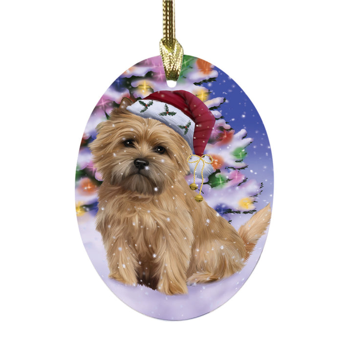 Winterland Wonderland Cairn Terrier Dog In Christmas Holiday Scenic Background Oval Glass Christmas Ornament OGOR49546
