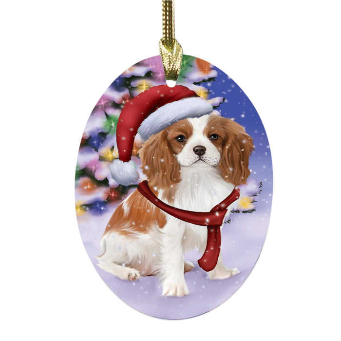 Winterland Wonderland Cavalier King Charles Spaniel Dog In Christmas Holiday Scenic Background Oval Glass Christmas Ornament OGOR49549